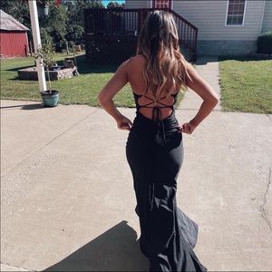 Black dress from the bridal shop in Nashville. Size 0 adjustable back.